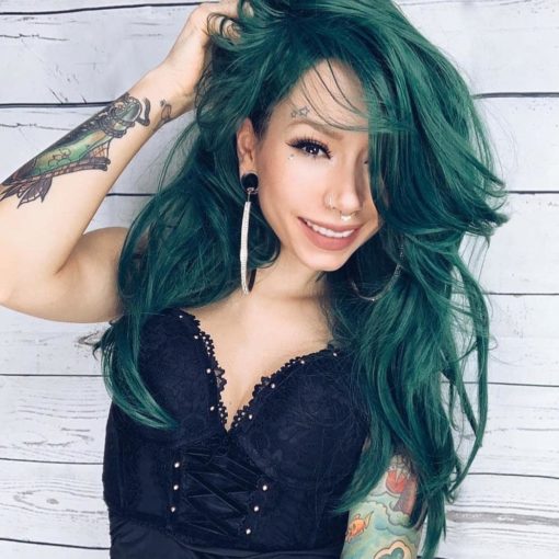 Forest defines deep green hair! Subtle layers give this sleek style some movement and texture. Falling to the waist, with a very long fringe that can be either pinned. Swept to the side, or parted for curtain bangs. Or cut into a fringe of your liking.