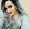 Black and silver long ombre wig with bangs. Silver ombre is a dazzling combination of dark and light. Its cool black roots with undertones of sliver and purple flow to the jawline that blends into silver hues. 