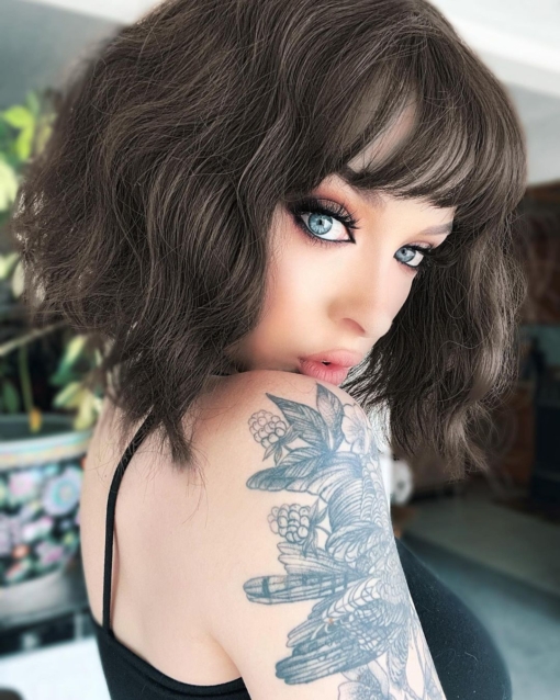 Cocoa is a natural and simple style that comes in a warm brunette shade, from roots to tips. Styled in loose beachy waves for texture, and a wispy fringe to frame the face. The length falls just above the shoulders. A classic bob that’s easy to wear.